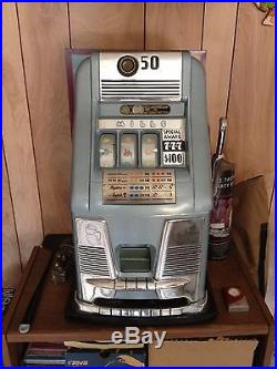 Circa 1948 Mills 50 Cents Slot Machine. Special Award 777