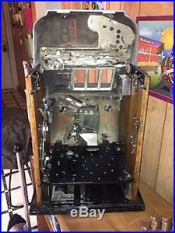 Circa 1948 Mills 50 Cents Slot Machine. Special Award 777