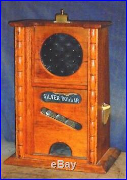 Davis Novelty SILVER DOLLAR JACKPOT, 1892, first jackpot slot machine ever