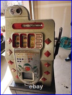 Diamond Front Early Cast Iron case all original black cherry nickel slot machine