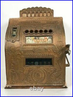 Earlier 1900's Mills Check Boy Slot Machine