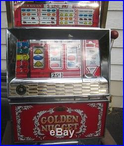 GOLDEN NUGGET slot machine 25 cent quarter genuine
