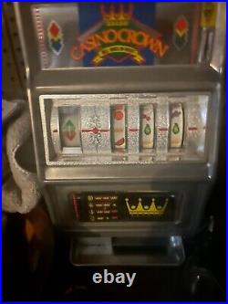 Gold crown 25 cent slot machine. Barely usedWorks great