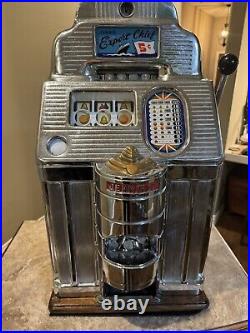 Jennings 5 cent Export Chief slot machine with roll around table