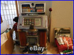Jennings Buckraroo 10 cent 4 Wheel, Slot Machine, works, as is