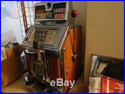 Jennings Buckraroo 10 cent 4 Wheel, Slot Machine, works, as is