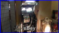 Jennings Buckraroo 10 cent 4 Wheel, Slot Machine, works, as is