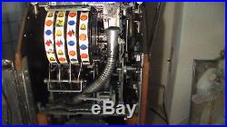 Jennings Buckraroo 10 cent 4 Wheel, Slot Machine, works, as is