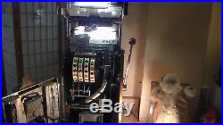 Jennings Buckraroo 10 cent 4 Wheel, Slot Machine, works, as is