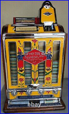 Jennings Penny Slot Machine with four front mint roll dispenser Circa 1930's