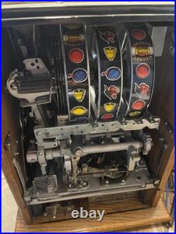 Mill's reproduction antique coin operated slot machine