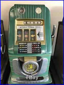 Mills $0.25c Token Bell Vintage Slot Machine