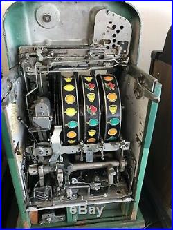 Mills $0.25c Token Bell Vintage Slot Machine
