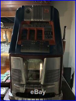 Mills 25 Cent 777 hi-top antique slot machine