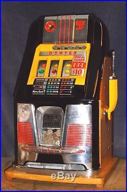Mills 25-cent 777 hi-top antique slot machine, 1947