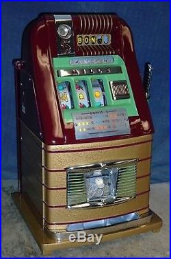 Mills 25-cent B-O-N-U-S hi-top antique slot machine, 1948
