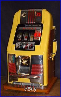 Mills 25-cent DEUCES WILD hi-top antique slot machine, 1950