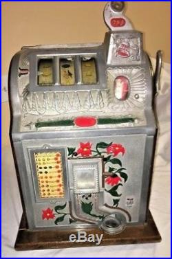 Mills 25 cent Poinsettia Slot Machine