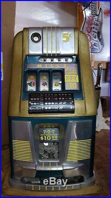 Mills 5-cent 777 hi-top antique slot machine, 1949