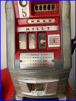 Mills 5 cent old style slot machine, full size, excellent working condition