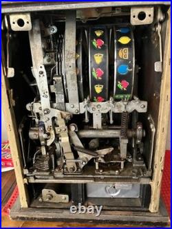 Mills 5 cent old style slot machine, full size, excellent working condition