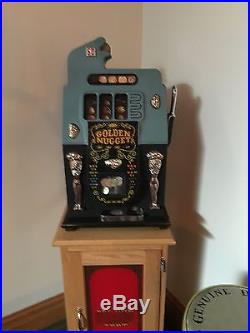 Mills 50c fish-mouth antique slot machine