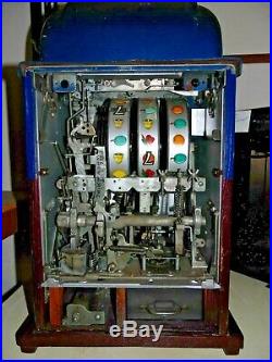 Mills 7-7-7 25 Cent Slot Machine