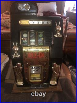 Mills Hole-In-One Three Reel Quarter 25 Cents Golfing Slot Machine, 1940s-1980s Mills Hole-In-One Three Reel Quarter 25 Cents Golfing Slot Machine, 1940s-1980s