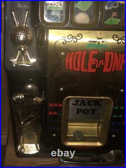 Mills Hole-In-One Three Reel Quarter 25 Cents Golfing Slot Machine, 1940s-1980s Mills Hole-In-One Three Reel Quarter 25 Cents Golfing Slot Machine, 1940s-1980s