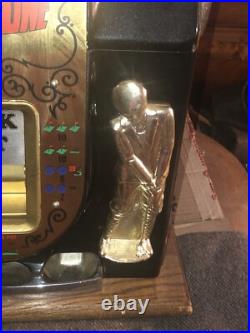 Mills Hole-In-One Three Reel Quarter 25 Cents Golfing Slot Machine, 1940s-1980s Mills Hole-In-One Three Reel Quarter 25 Cents Golfing Slot Machine, 1940s-1980s