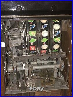 Mills Hole-In-One Three Reel Quarter 25 Cents Golfing Slot Machine, 1940s-1980s