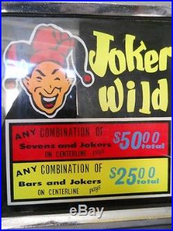 Mills Joker Wild Antique Slot Machine with Stand