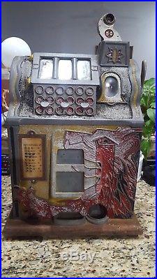 Mills Nickel Lion Head Slot machine