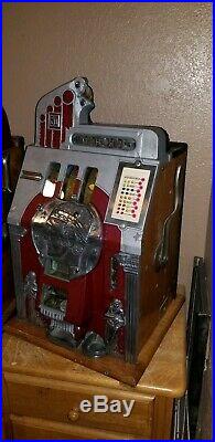 Mills Roman head Slot Machine. 50 half dollar