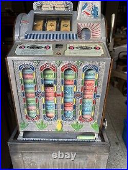 Mills five cent slot machine with mid vendor front