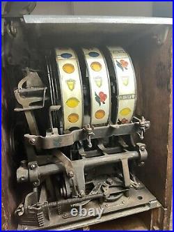 Mills slot machine Rare 1920s Jackpot Poinsettia