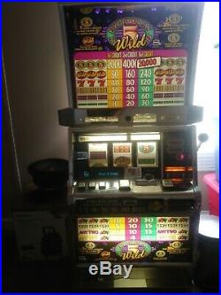Nice Slot Machine 5 times pay. Works great. Accepts 1.5.10.20.50.100s. Has c