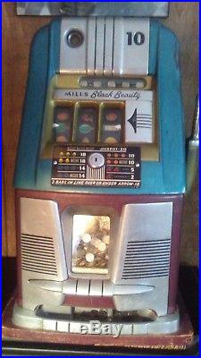 Pre War Mills Antique 10 cent Slot Machine in excellent condition