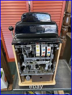 Quarter $0.25 Antique Jennings Black Hawk vintage Slot Machine