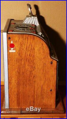 Restored 1920's Mills Pointsetta 5 cent Slot Machine