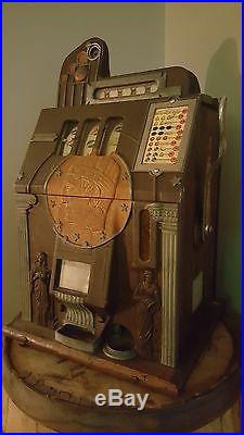 VINTAGE 5 cent nickle roman head slot machine - RARE - mills silent gold