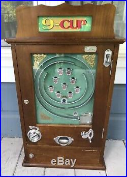 Vintage Allwin 9 Cup Coin Operated Wall Slot Machine Game