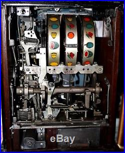 Vintage Hand-Carved Bandit Character Slot Machine, 1947 $50 Special Award 777