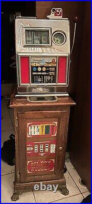 Vintage Harvey's Wagon Wheel 5 Cent Slot Machine With Stand