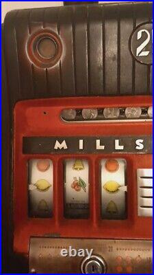 Vintage Mills $. 25 Hi Top Slot Machine