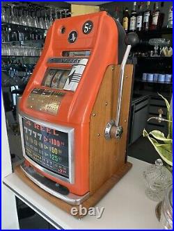 Vintage Mills 4-reel slot machine