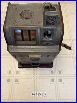 Vintage Slot Machine (dimes are not in the machine)