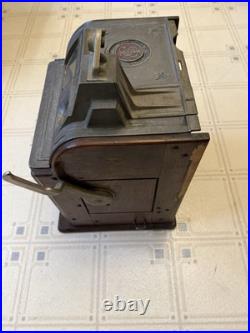 Vintage Slot Machine (dimes are not in the machine)