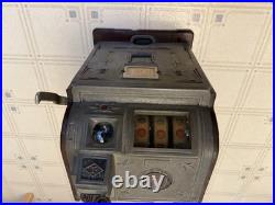 Vintage Slot Machine (dimes are not in the machine)