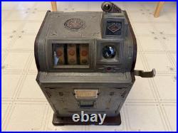 Vintage Slot Machine (dimes are not in the machine)